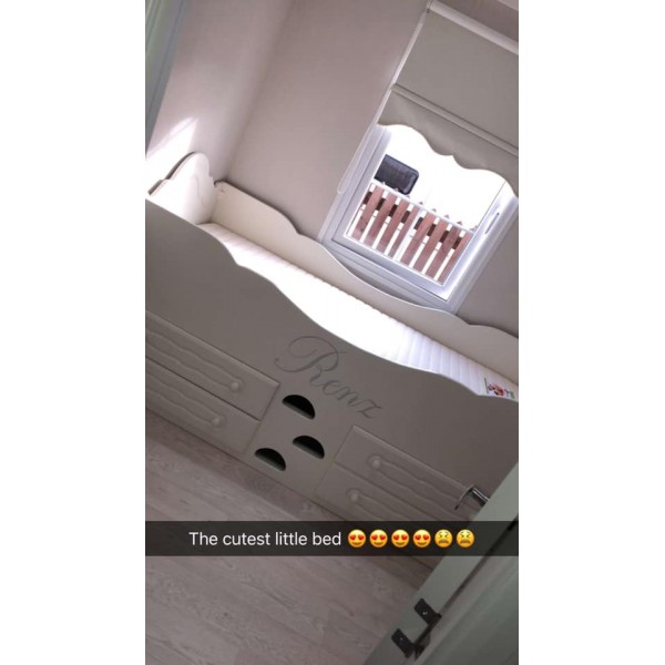 Low Cabin Bed With Fancy Ends 