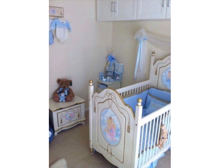 Cot With Posts And Cherub Artwork